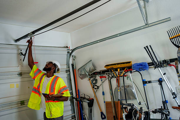 Professional Garage Door Panel Replacement technician working in Poplarville, MS